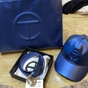 Authentic Telfar GM Handbag! The belt and the hat is brand new authentic also.